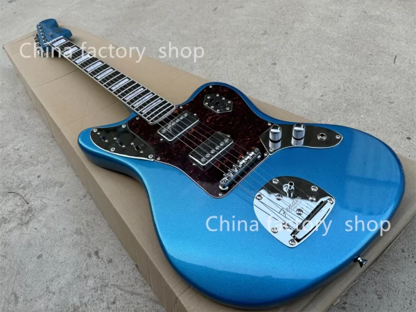 6 string metallic blue jaguar electric guitar, rosewood fretboard block mosaic, chrome hardware, red turtle pickguard