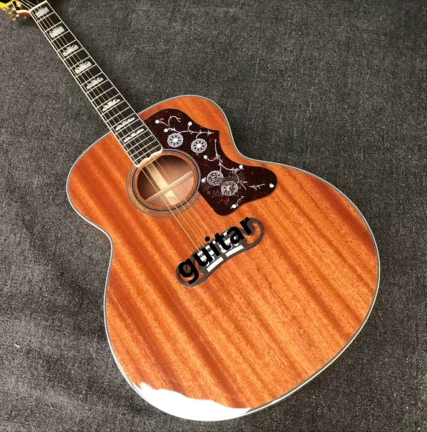 43 "j200 series full mahogany solid wood section refers to playing acoustic guitar