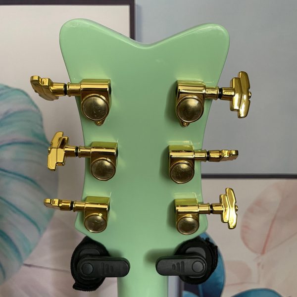 bo diddley green electric guitar 6 string basswood maple neck with rosewood fretboard, golden tone jazz bridge & hardwired electronics, vintage style for jazz & rock music, electric guitar, rock and roll guitar, classic guitar design, detailed craftsmanship
