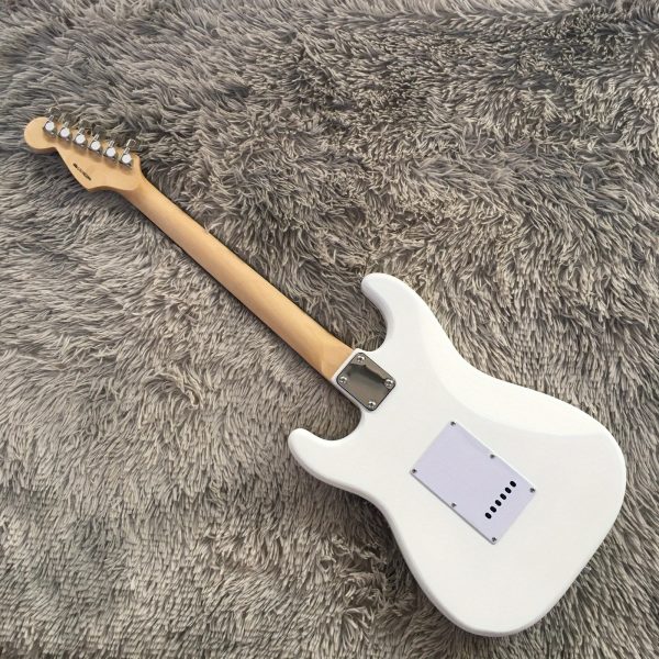6 string st electric guitar light blue solid basswood body, maple neck, ssh pickups, rosewood fretboard, quilted maple top, chrome hardware, 22 frets, single tremolo bridge, fully enclosed design