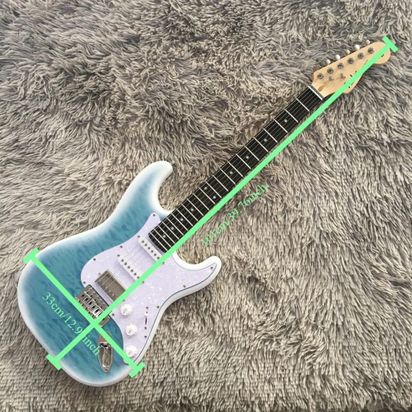 6 string st electric guitar light blue solid basswood body, maple neck, ssh pickups, rosewood fretboard, quilted maple top, chrome hardware, 22 frets, single tremolo bridge, fully enclosed design