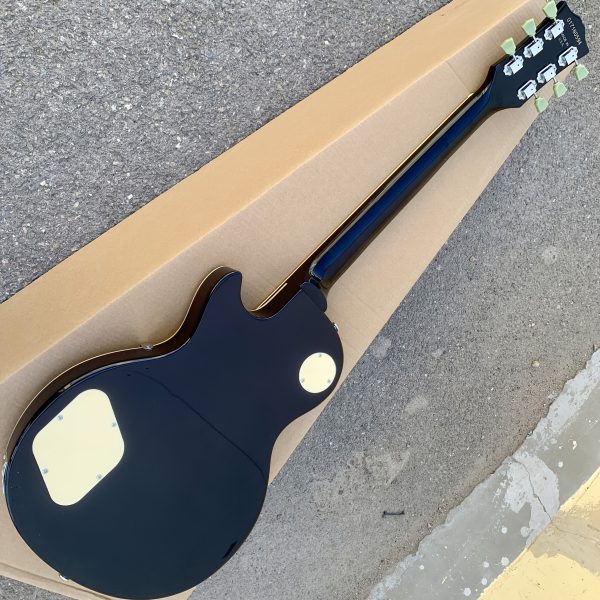 electric guitar with carbon tassel detail black & teal hybrid design, 22 frets, f hole details, & rosewood neckboard room electrical hardwired, 36v or below, electric guitar