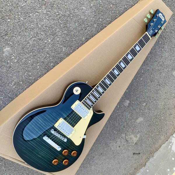 electric guitar with carbon tassel detail black & teal hybrid design, 22 frets, f hole details, & rosewood neckboard room electrical hardwired, 36v or below, electric guitar