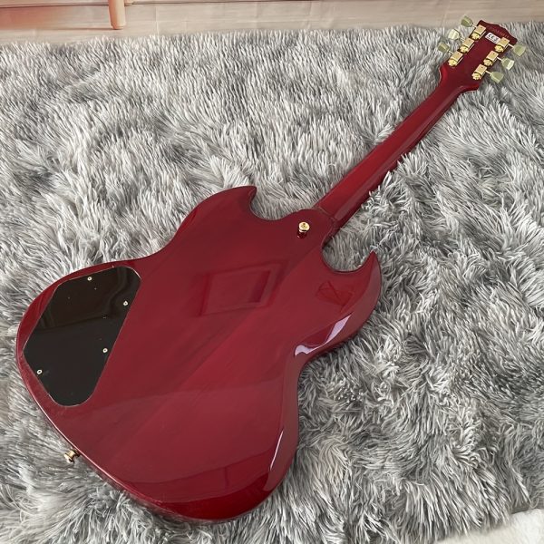 chinese electric guitar mahogany body rosewood fingerboard with three double pickups, bone and string pillows, stainless steel round head, silk golden accessories, made in china