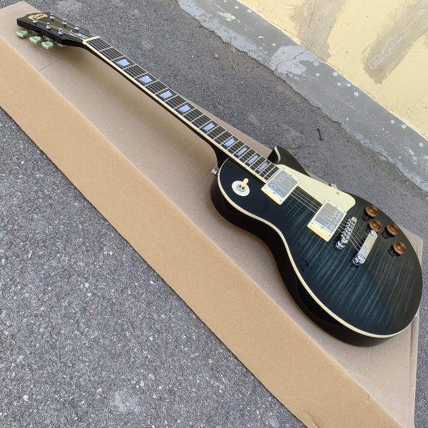electric guitar with carbon tassel detail black & teal hybrid design, 22 frets, f hole details, & rosewood neckboard room electrical hardwired, 36v or below, electric guitar