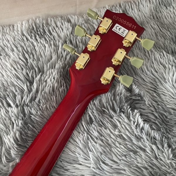 chinese electric guitar mahogany body rosewood fingerboard with three double pickups, bone and string pillows, stainless steel round head, silk golden accessories, made in china