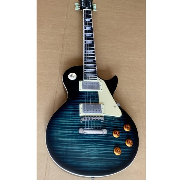 electric guitar with carbon tassel detail black & teal hybrid design, 22 frets, f hole details, & rosewood neckboard room electrical hardwired, 36v or below, electric guitar