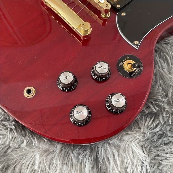 chinese electric guitar mahogany body rosewood fingerboard with three double pickups, bone and string pillows, stainless steel round head, silk golden accessories, made in china