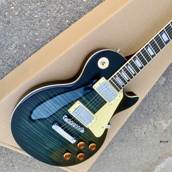 electric guitar with carbon tassel detail black & teal hybrid design, 22 frets, f hole details, & rosewood neckboard room electrical hardwired, 36v or below, electric guitar