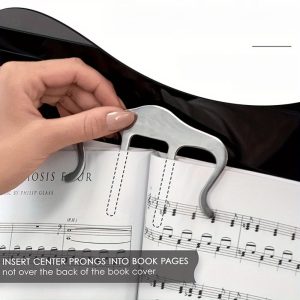 a large music stand specially designed for piano, guitar, and violin, securely holding sheet music in place for easy reading.