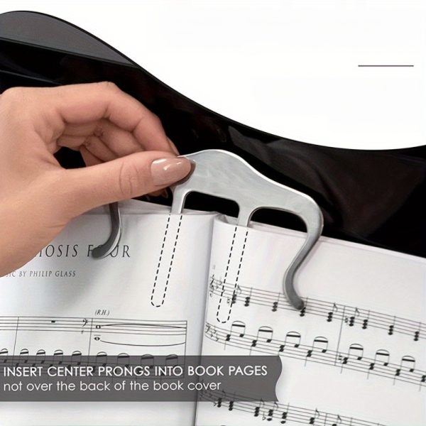 a large music stand specially designed for piano, guitar, and violin, securely holding sheet music in place for easy reading.