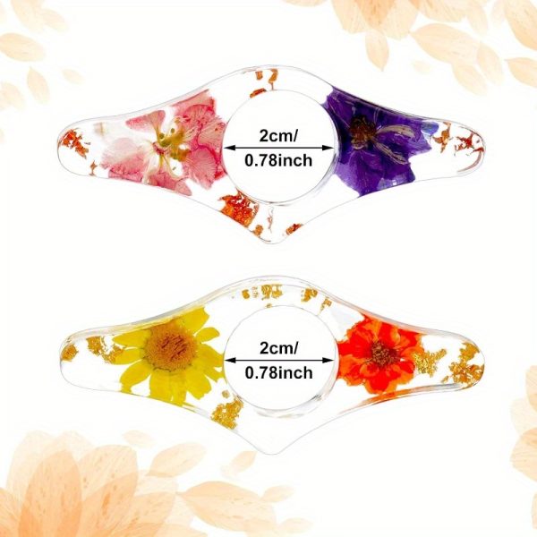 two handmade transparent thumb rings featuring dried flowers, designed as personalized bookmarks for book lovers and teachers, adding a stylish touch to reading.
